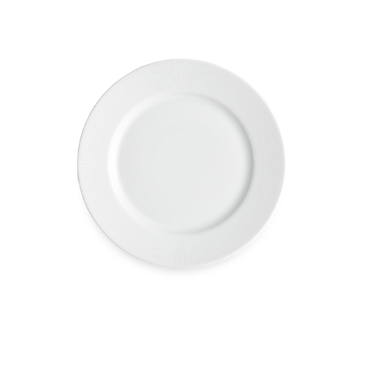 White ceramic plate on a white background