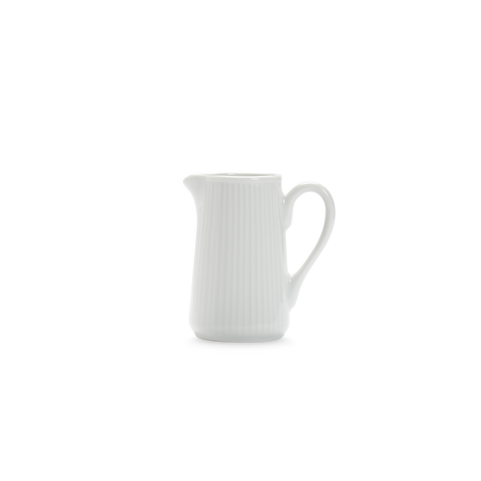 White ceramic pitcher on a white background