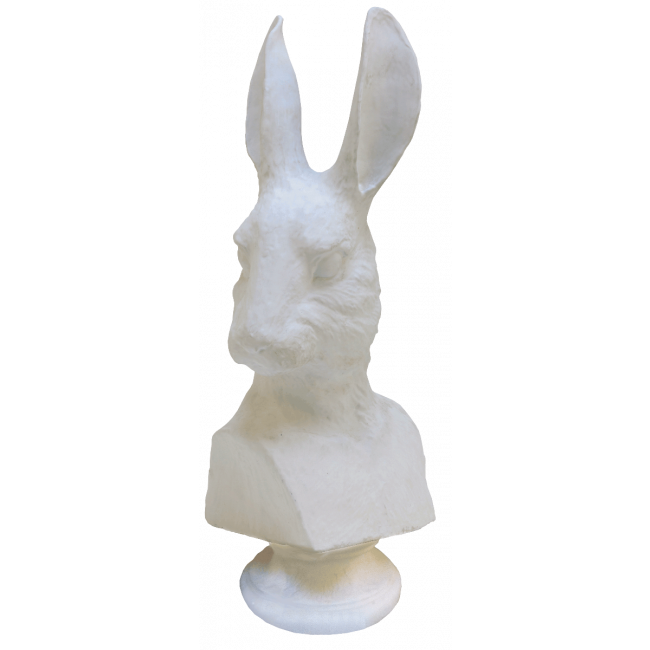 White marble bust of a figure with prominent ears on a white background