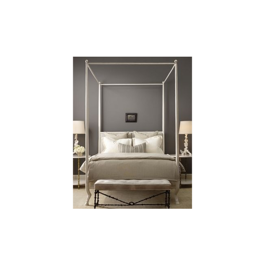 Bedroom with a canopy bed and gray walls