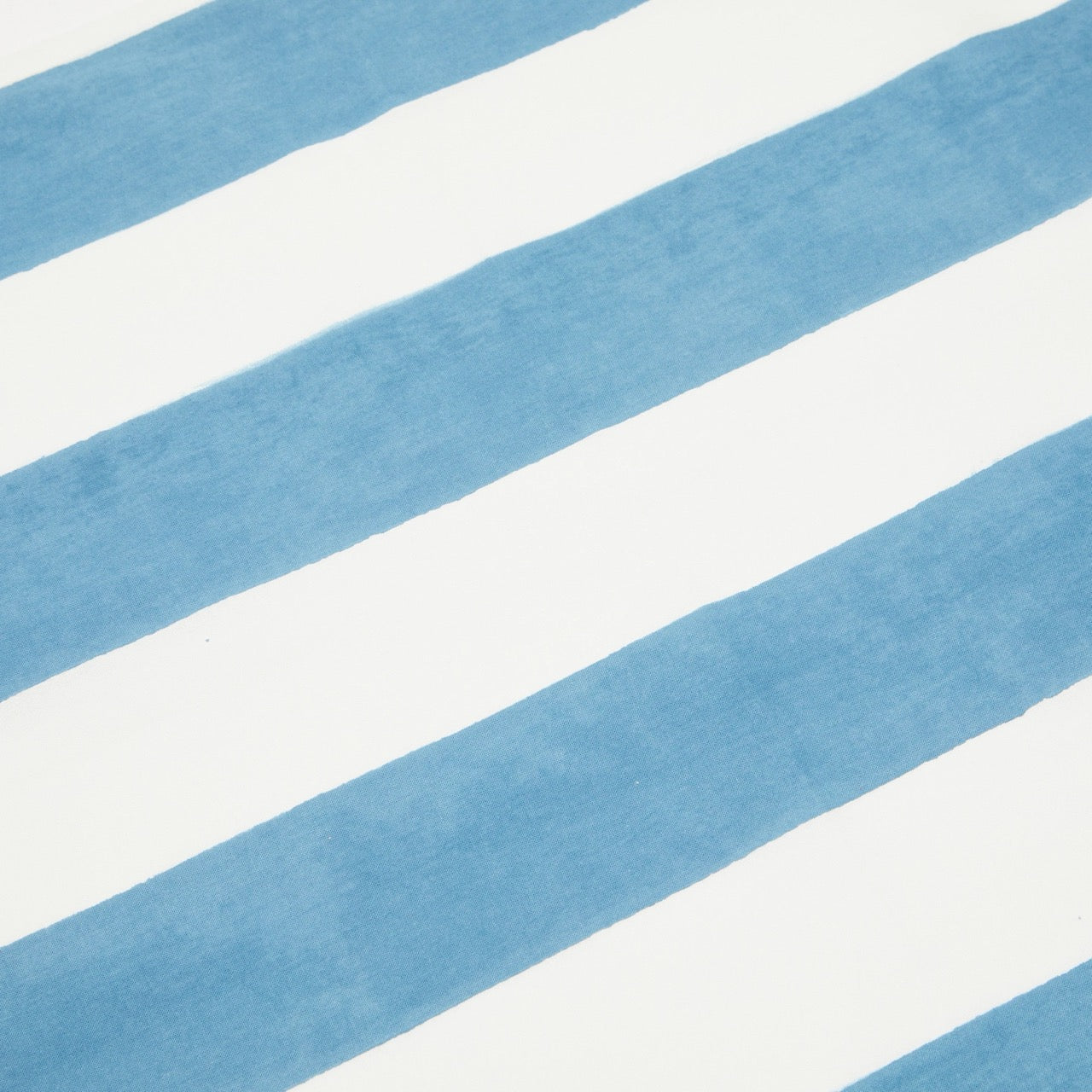 Close-up of blue and white striped fabric texture