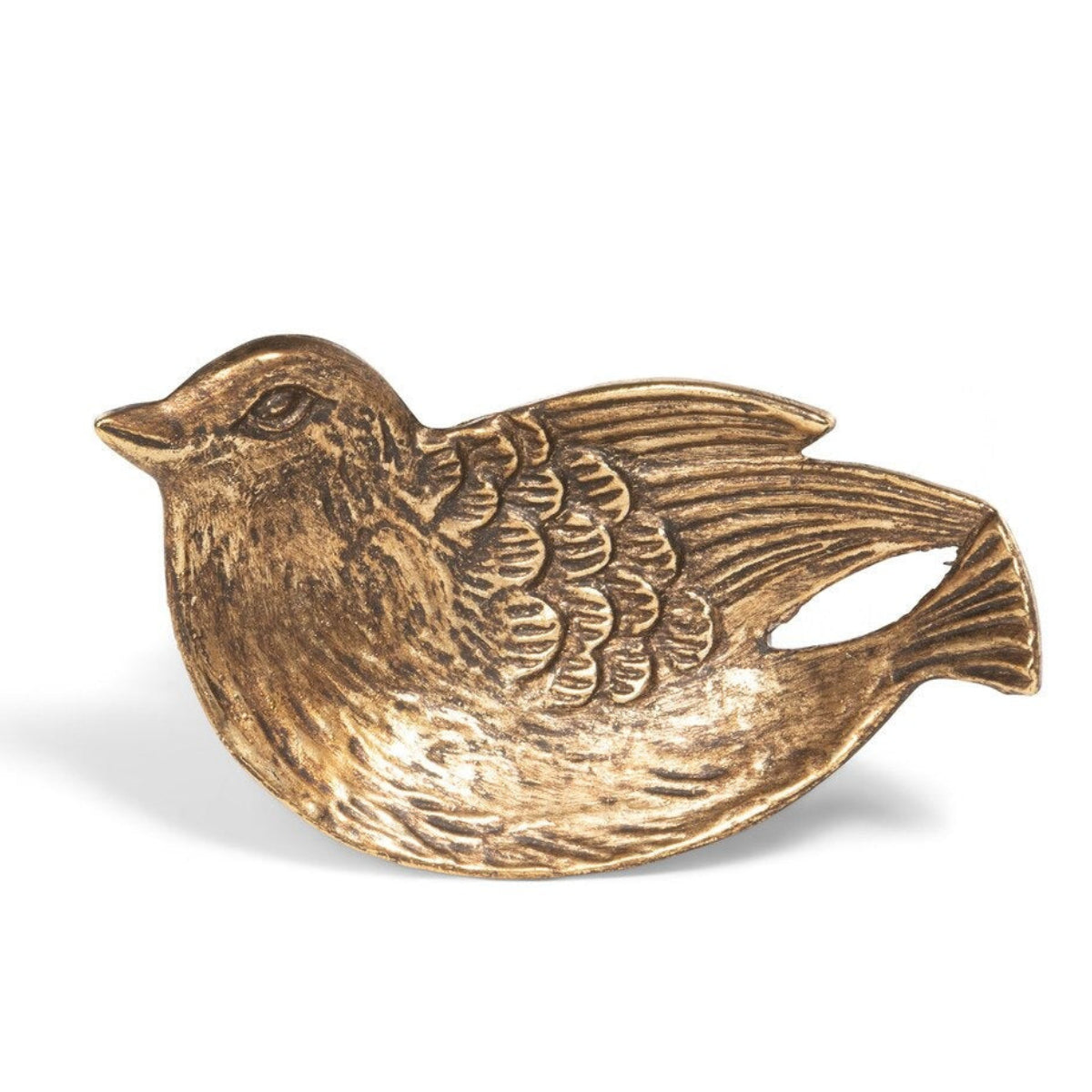 Gold bird-shaped object on a white background