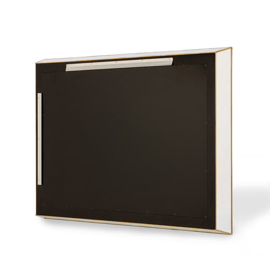 Black rectangular object with gold trim on a white background