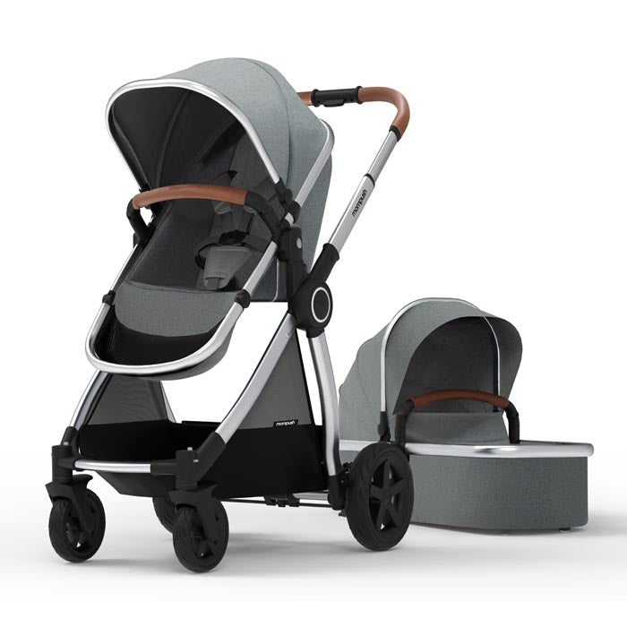 Modern stroller with a baby seat and bassinet on a white background