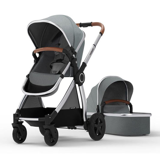 Modern stroller with a baby seat and bassinet on a white background