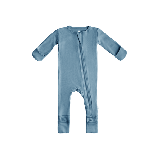 Blue baby onesie with a zipper on a white background
