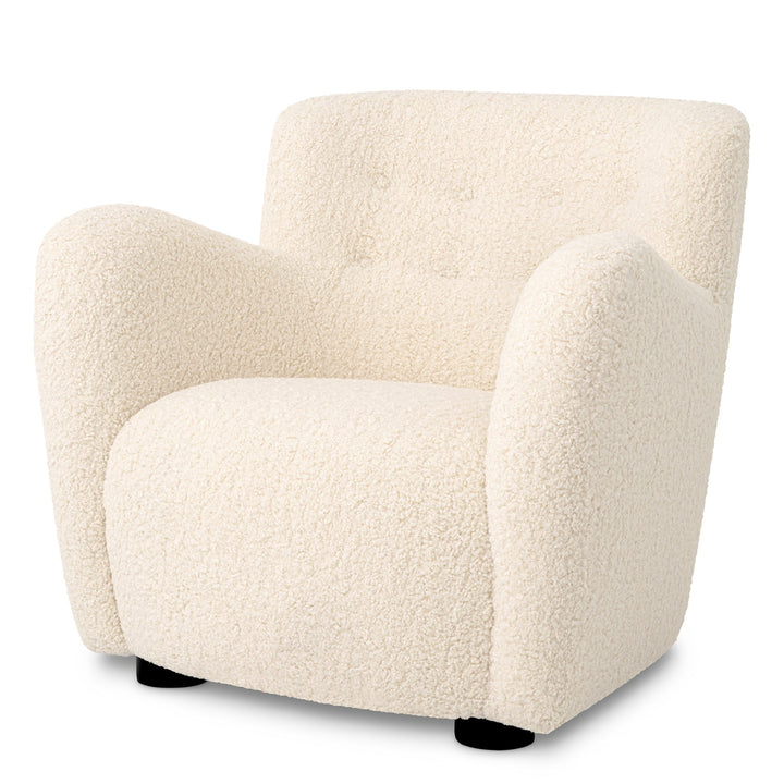 This Contemporary Chair by Tara Shaw piece provides a perfect spot to cozy up and unwind. 