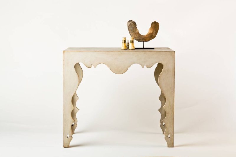 Contemporary Rococo Console Table in Painted Swedish Finish by Tara Shaw with couple of art figures on top.