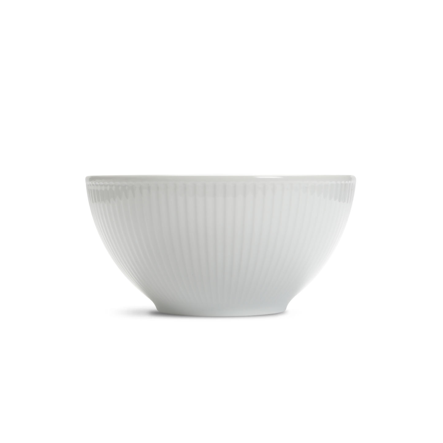 White ceramic bowl with ribbed texture on a white background