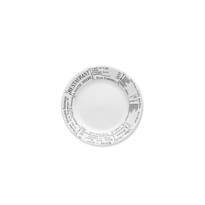 Round white plate with black text on a white background
