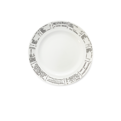 White plate with black text around the rim on a white background
