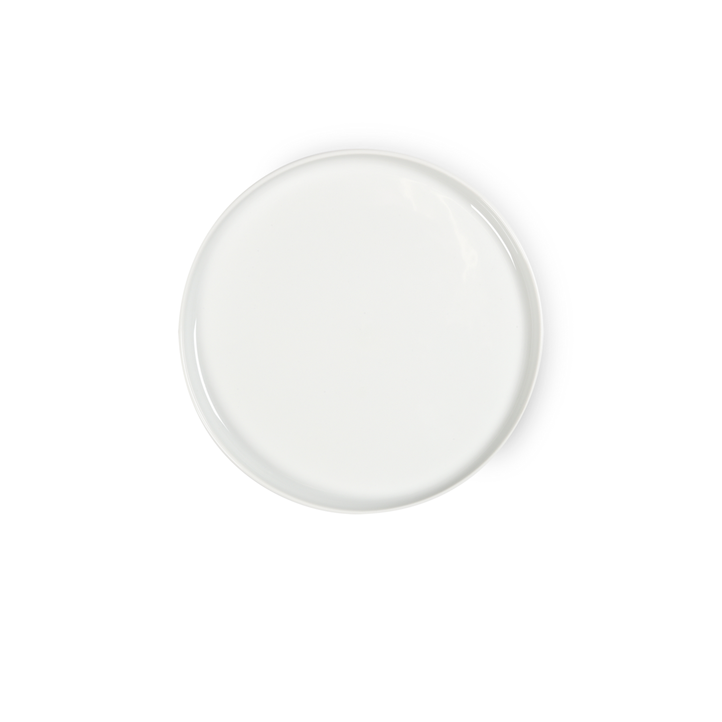 White round plate on a white background