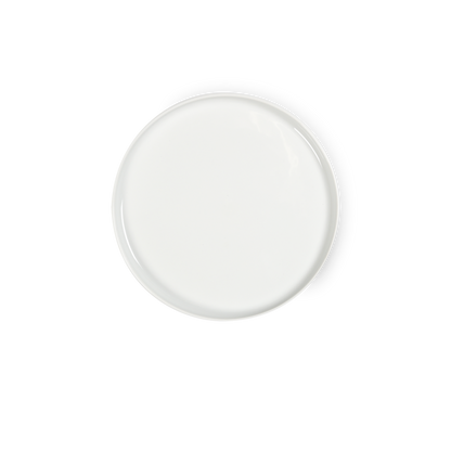 White round plate on a white background