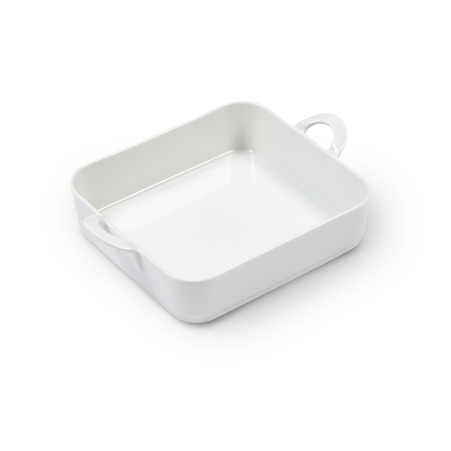 White rectangular ceramic dish with handles on a white background