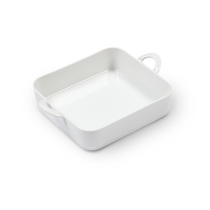 White rectangular ceramic dish with handles on a white background