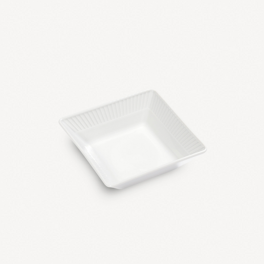 White square porcelain plate on a white background