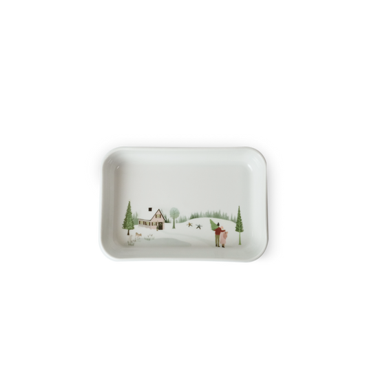 Rectangular ceramic tray with a winter scene design on a white background