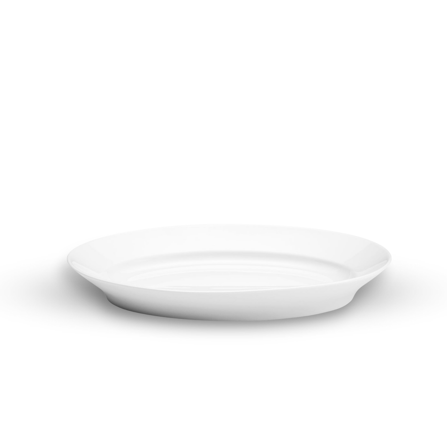 White ceramic plate on a white background