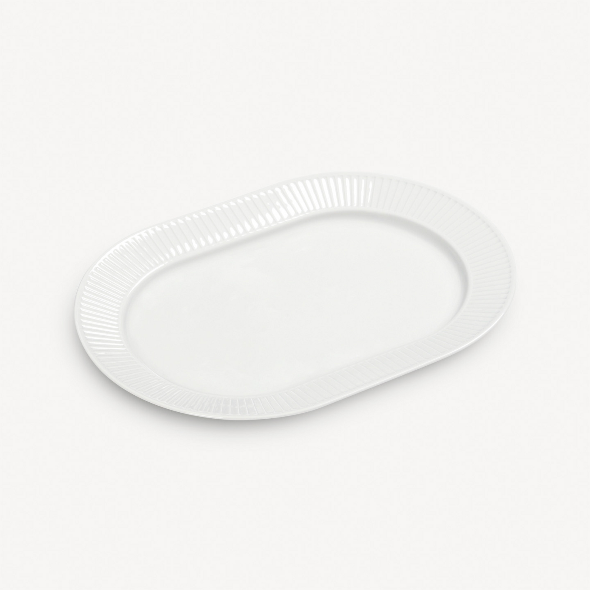 White oval platter on a light gray background