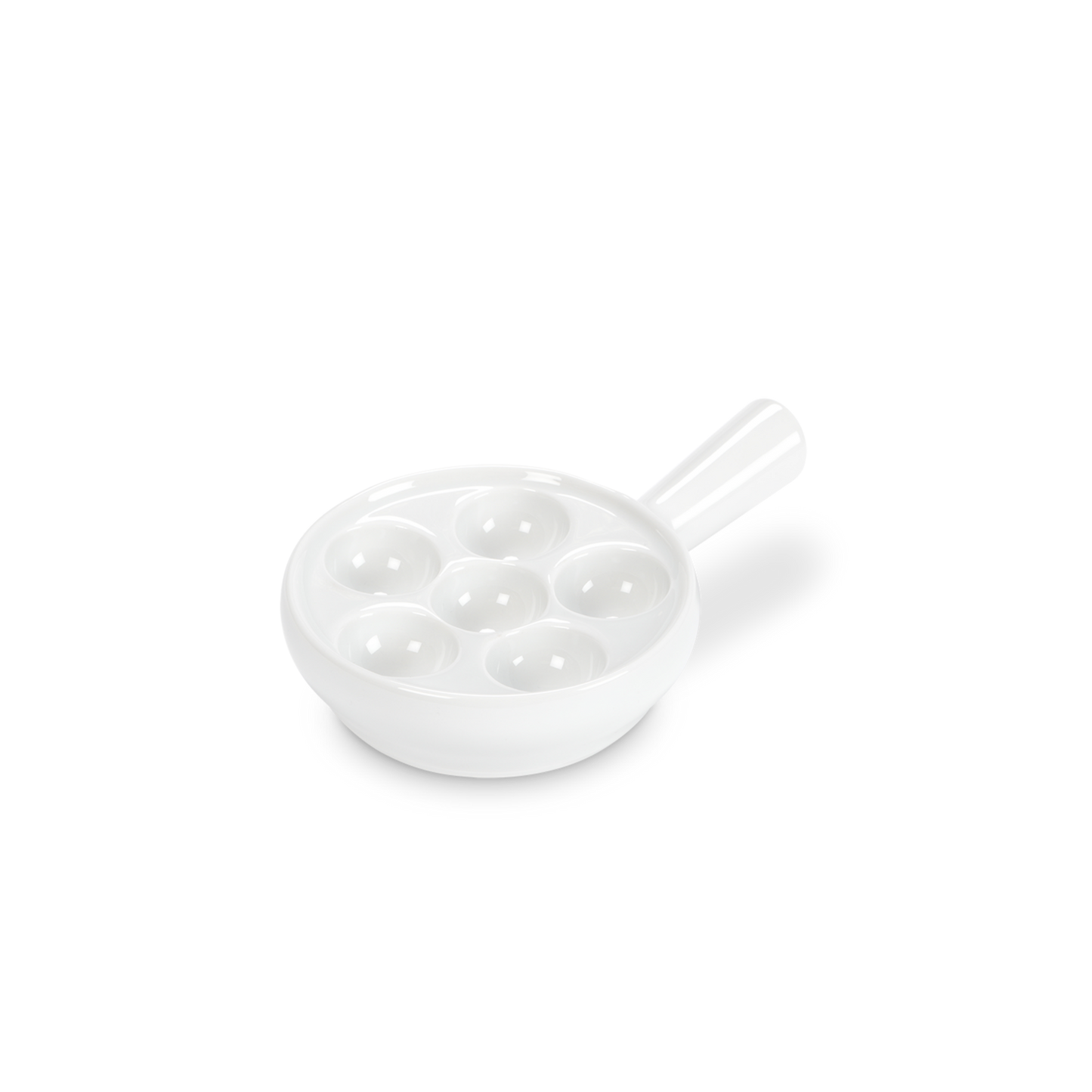 White ceramic egg poacher on a white background