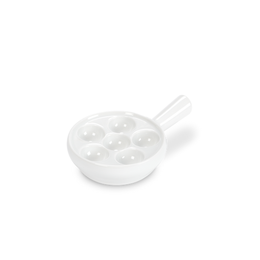 White ceramic egg poacher on a white background