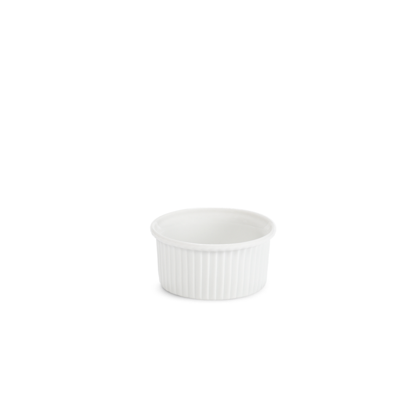 White ceramic ramekin with textured interior on a white background