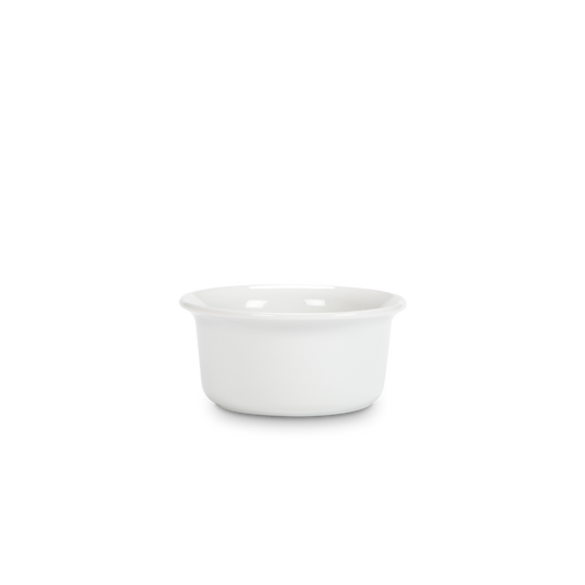 White ceramic ramekin on a white background