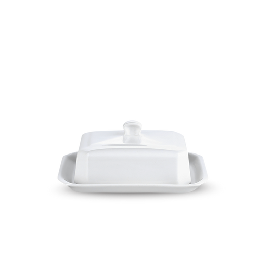 White ceramic butter dish on a white background
