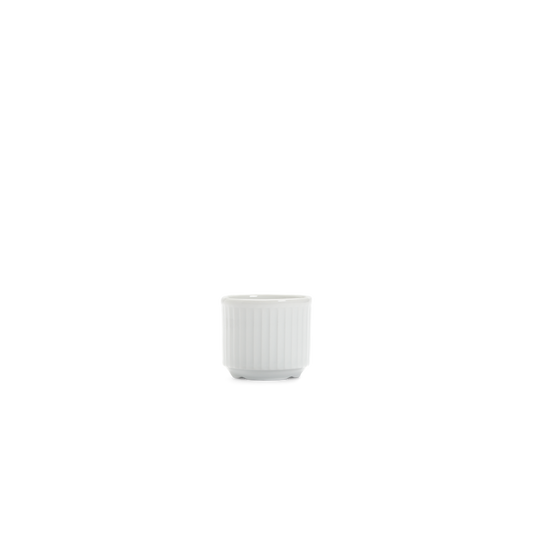 White ceramic pot with ribbed texture on a white background