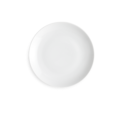White round dish on a white background