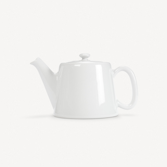 White teapot on a light gray background