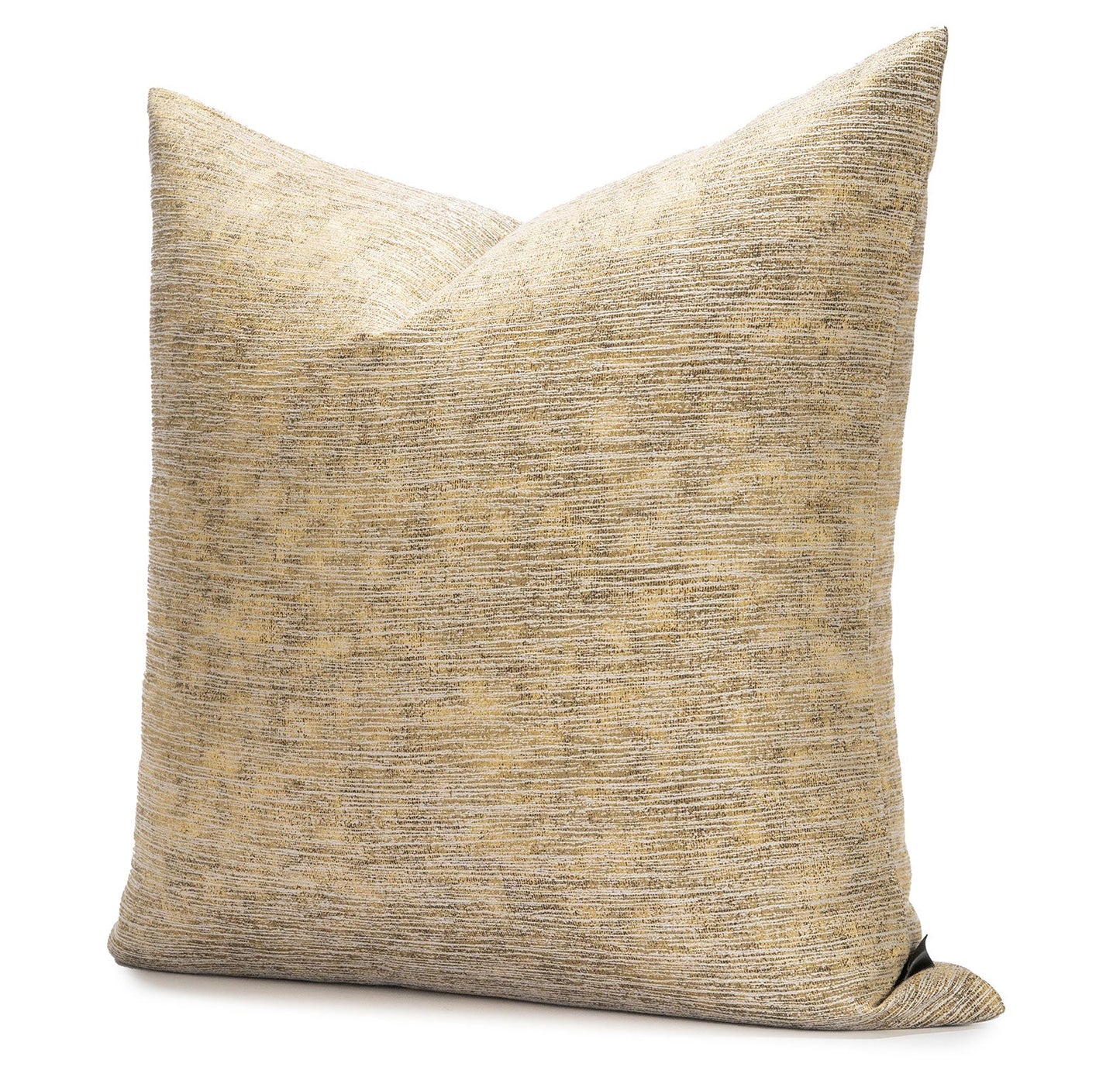Textured gold and black pillow on a white background