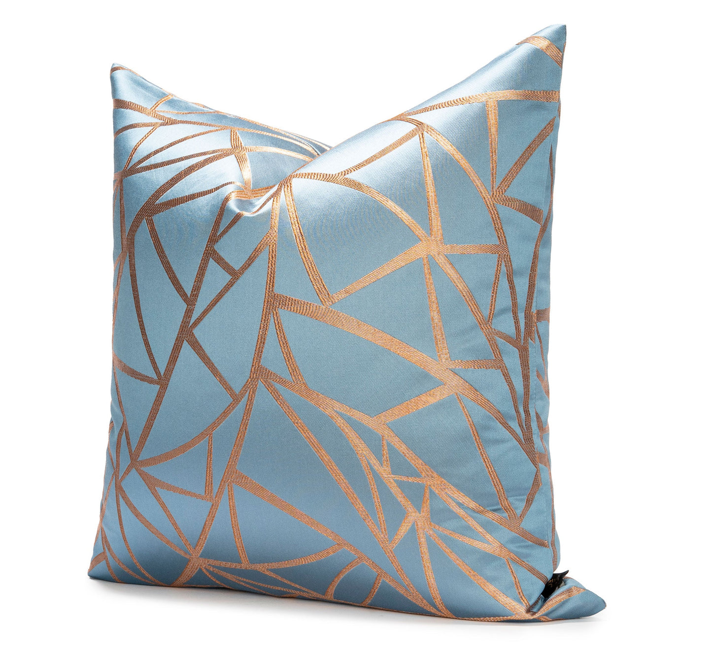 Decorative pillow with geometric pattern on a light blue background