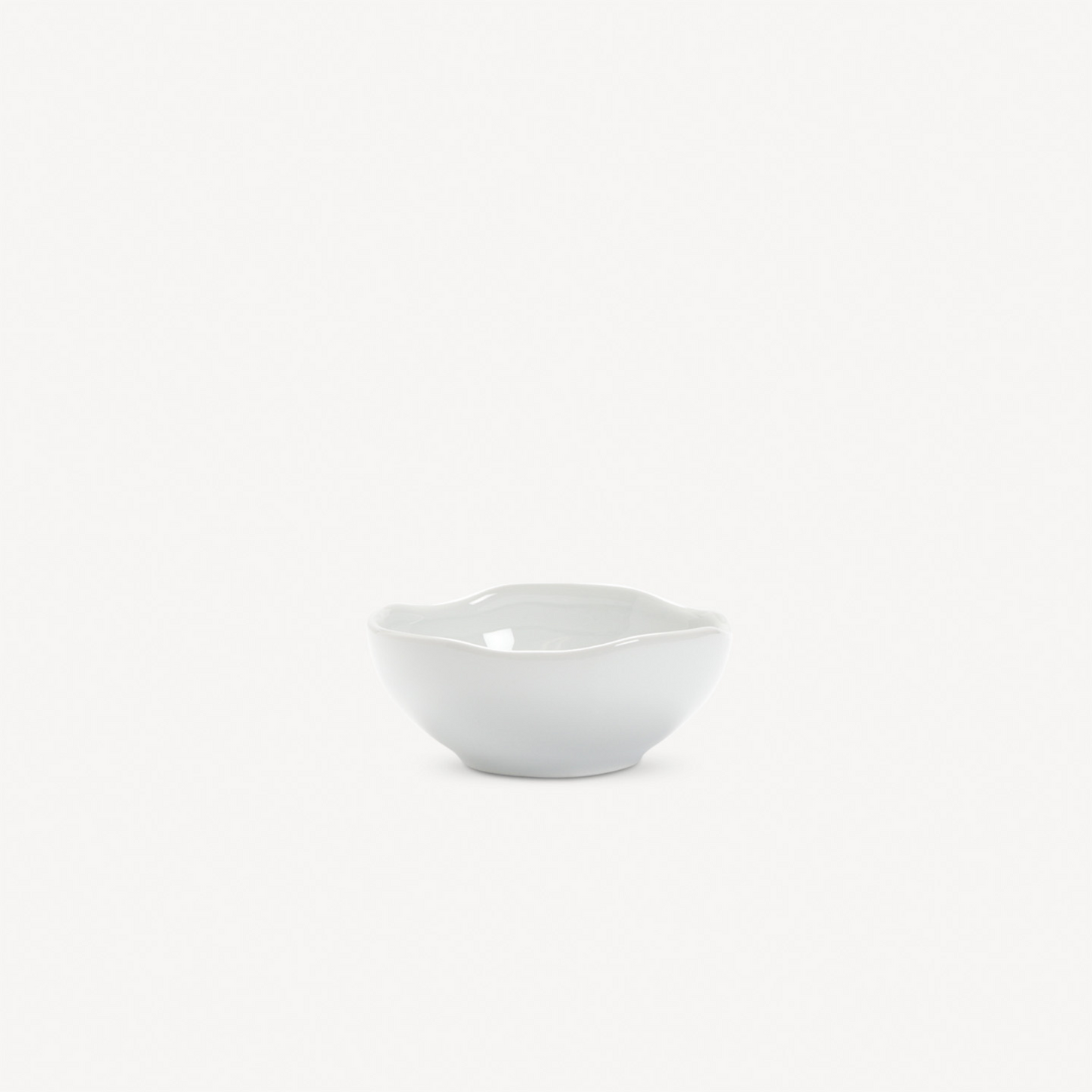 White ceramic bowl on a light gray background