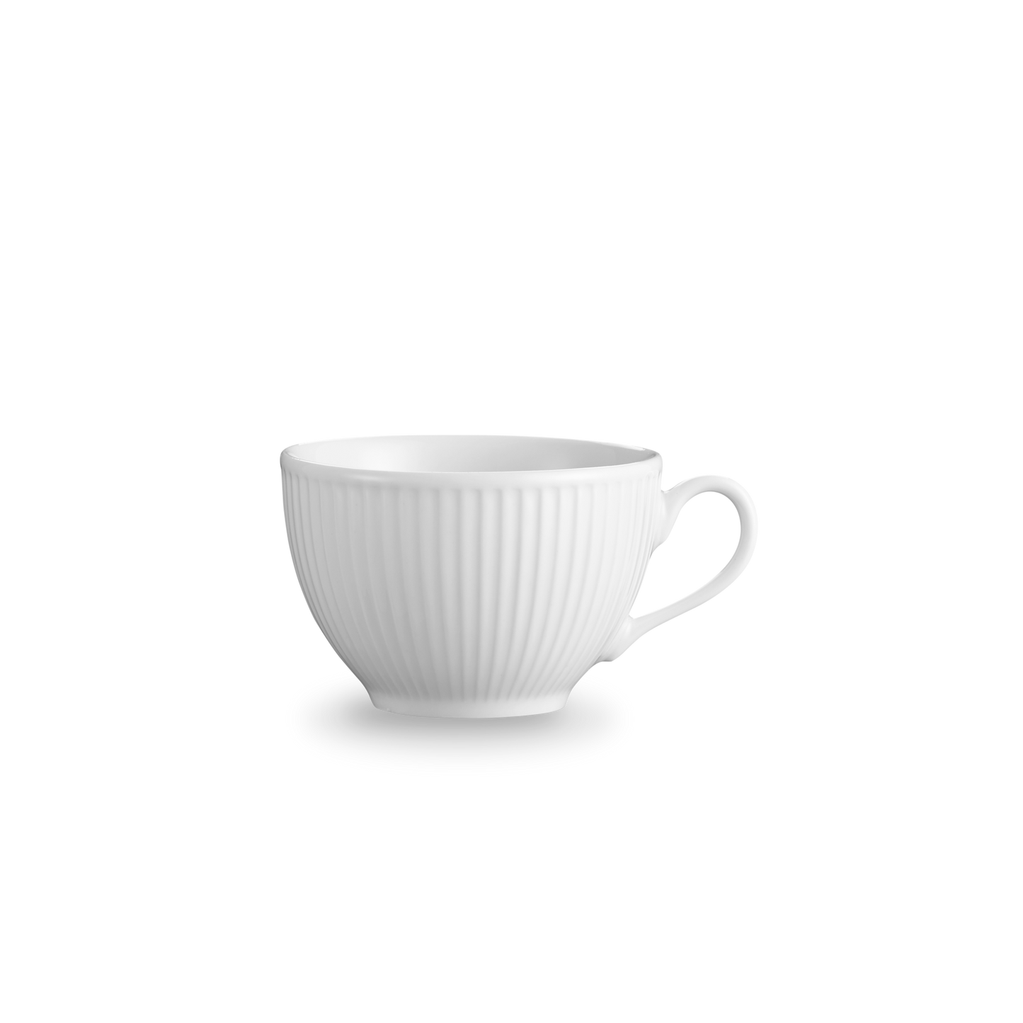 White ceramic cup with ribbed texture on a white background