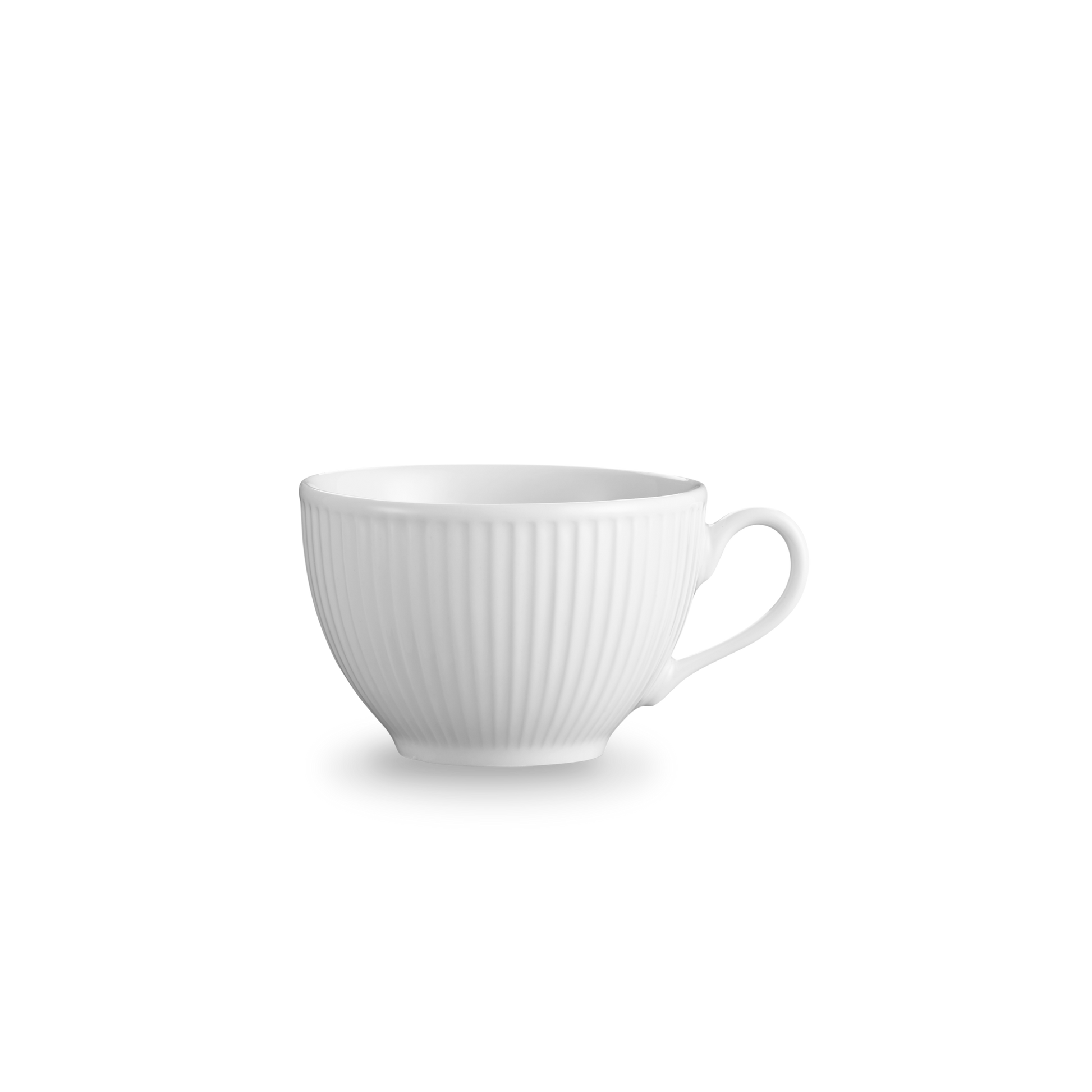 White ceramic cup with ribbed texture on a white background