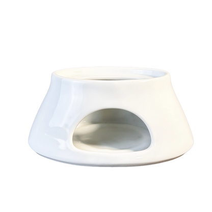 White ceramic planter with a circular opening on a white background
