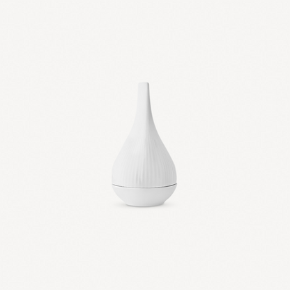 White ceramic teardrop-shaped vase on a white background