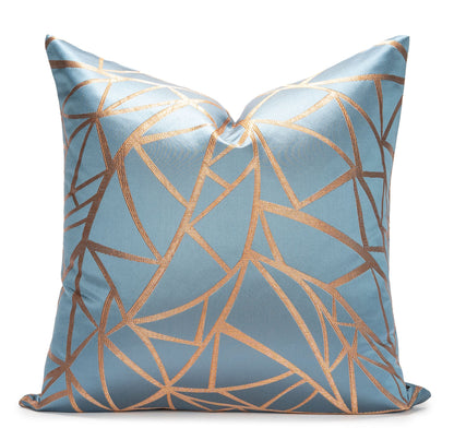Decorative pillow with geometric pattern on a light blue background
