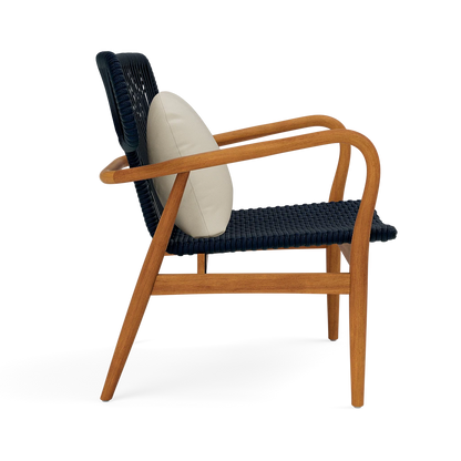 Chair with wooden frame, blue woven backrest, and beige cushion on a white background