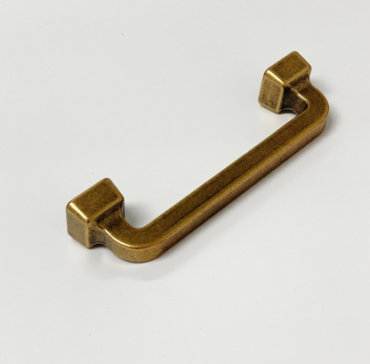 Bronze cabinet handle on a white background