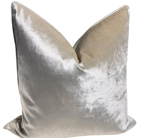 Silver metallic pillow on a  white background