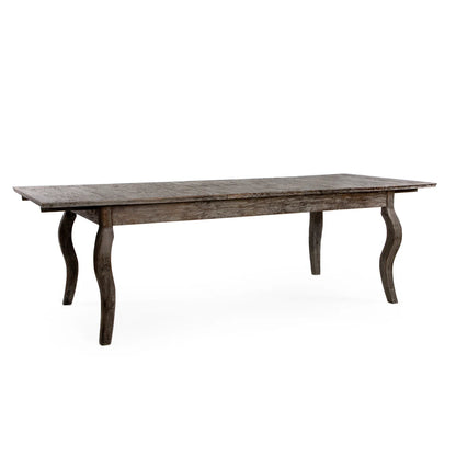 Wooden dining table with a rustic finish on a white background