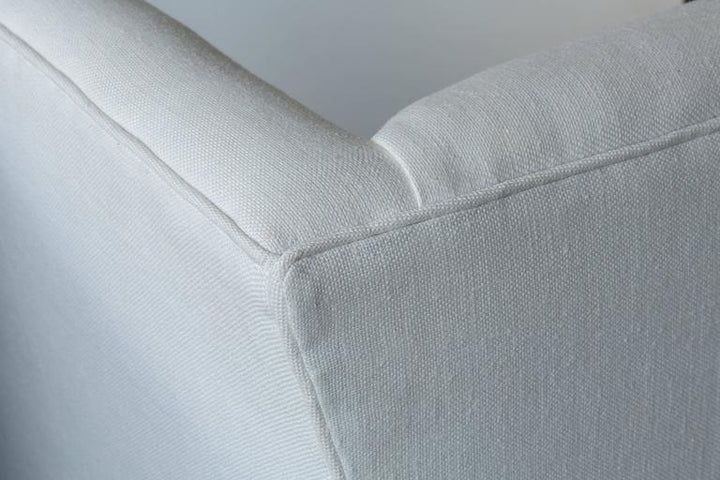 Contemporary Linen Sofa with Iron Base by Tara Shaw close up view of piping