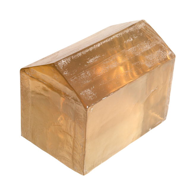 Gold-colored cube on a white background