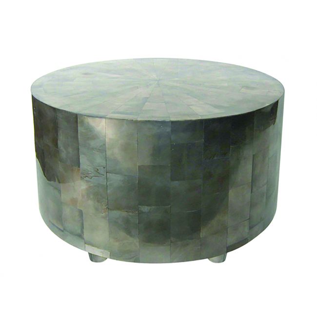 Round stone table with a patterned surface on a white background