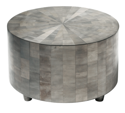 Round wooden coffee table with a starburst pattern on a white background