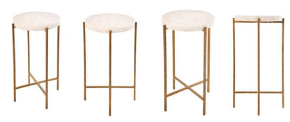 Four gold bar stools with white cushioned seats on a white background