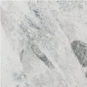 Close-up of a marble-like stone surface with gray and white patterns