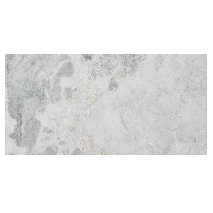 Gray marble tile with a subtle pattern on a white background